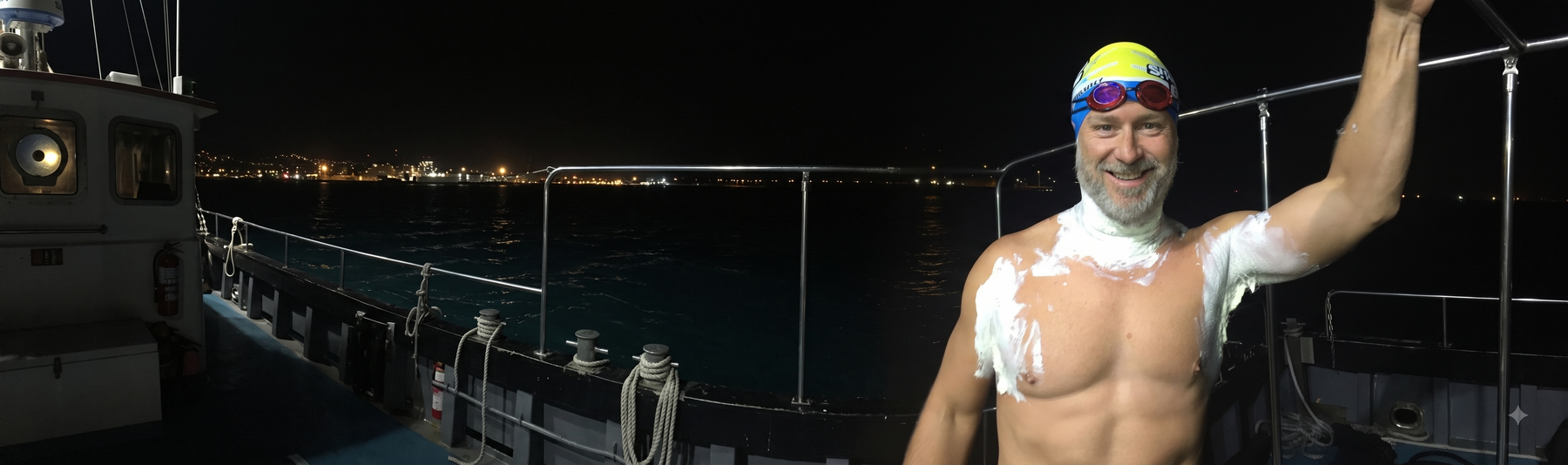 Sam Penny swimming in English Channel in winter at night